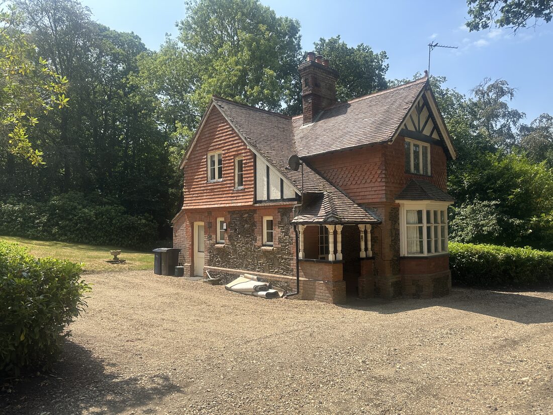Red-brick Victorian lodge cottage