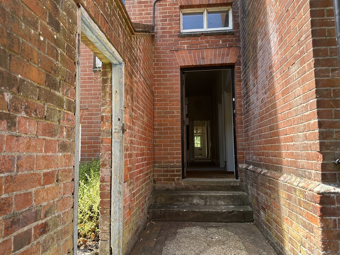 Rear entrance brick steps