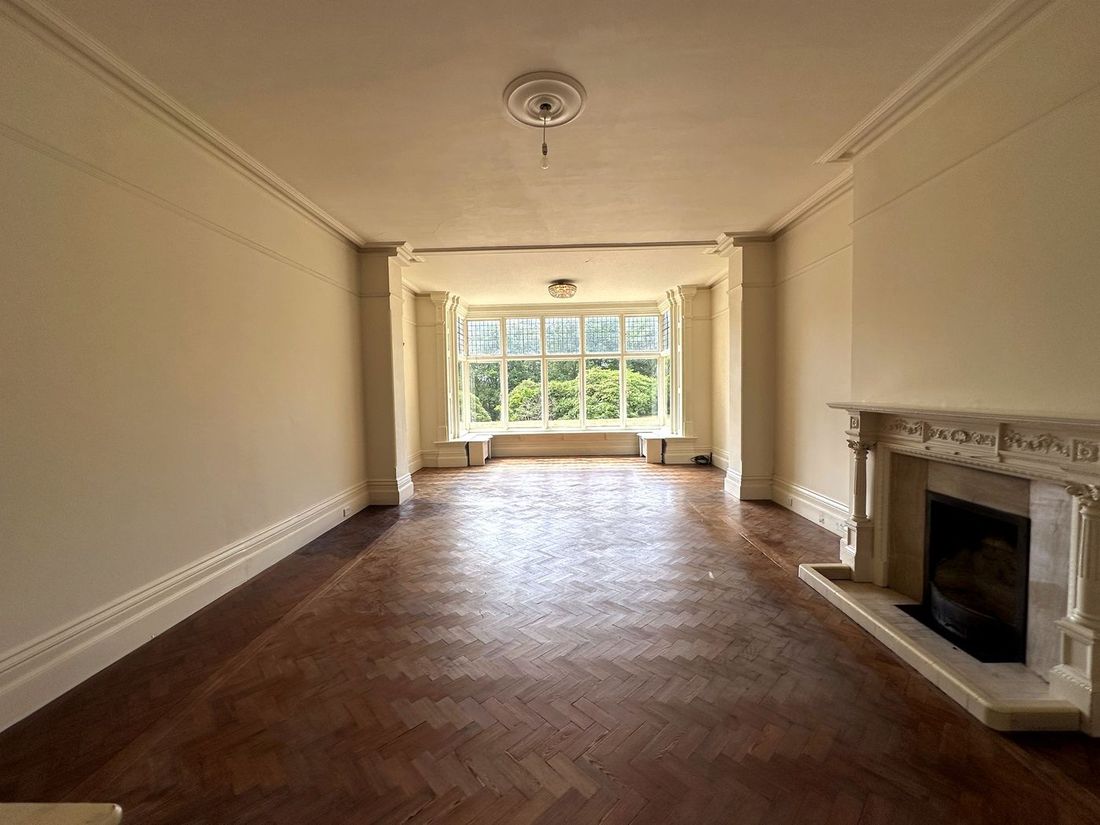 Period reception room with fireplace