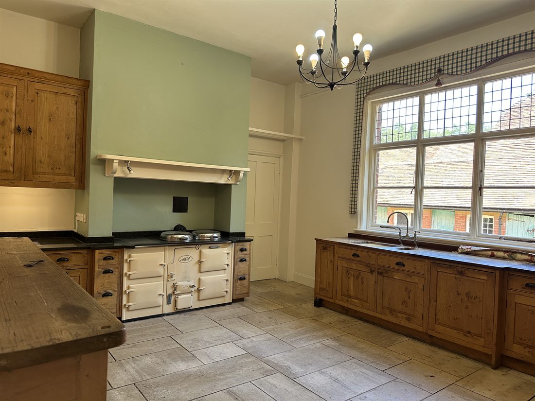 Victorian kitchen with a cream Aga range